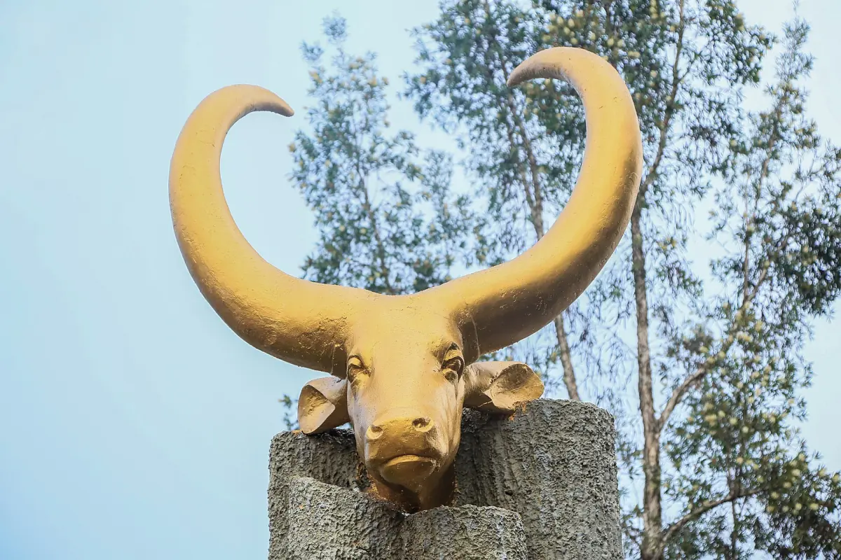 Golden horned cow monument outside the ethnographic museum in Huye
