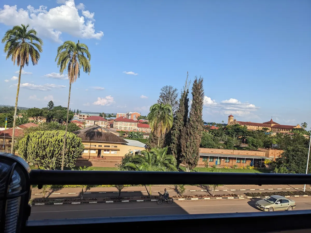 View over the rooftops and palms of Huye town