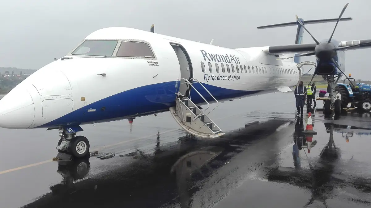 Turboprop airliner parked on the apron at Kamembe Airport